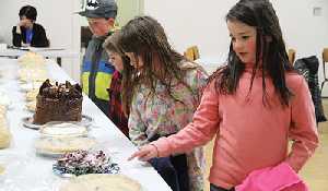 Fleming community hosts hybrid pie auction for this years fundraiser 